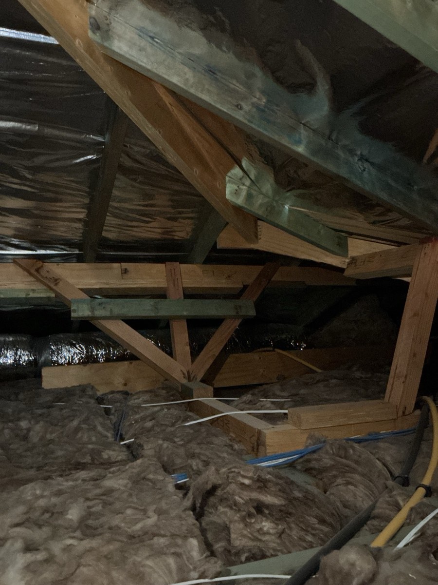 Downlight minimum clearance required, recorded during a handover inspection in Austral
