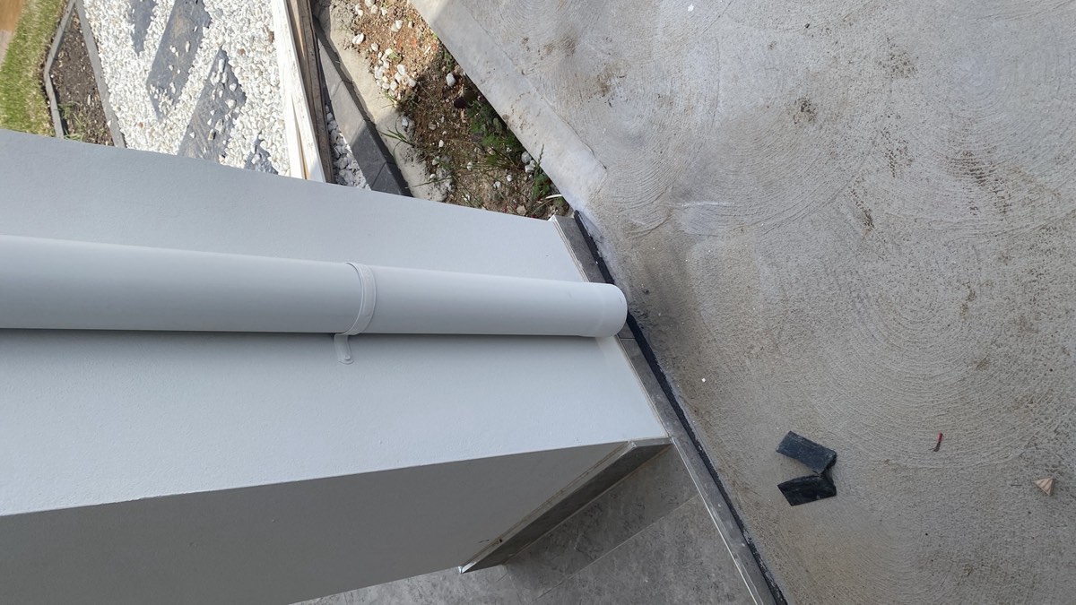 Downpipe not connected, recorded during a handover inspection in Austral